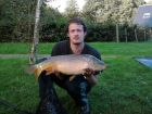 14 pound mirror carp caught at dandys ford on sunday the 18th sept caught by lawrence parker.